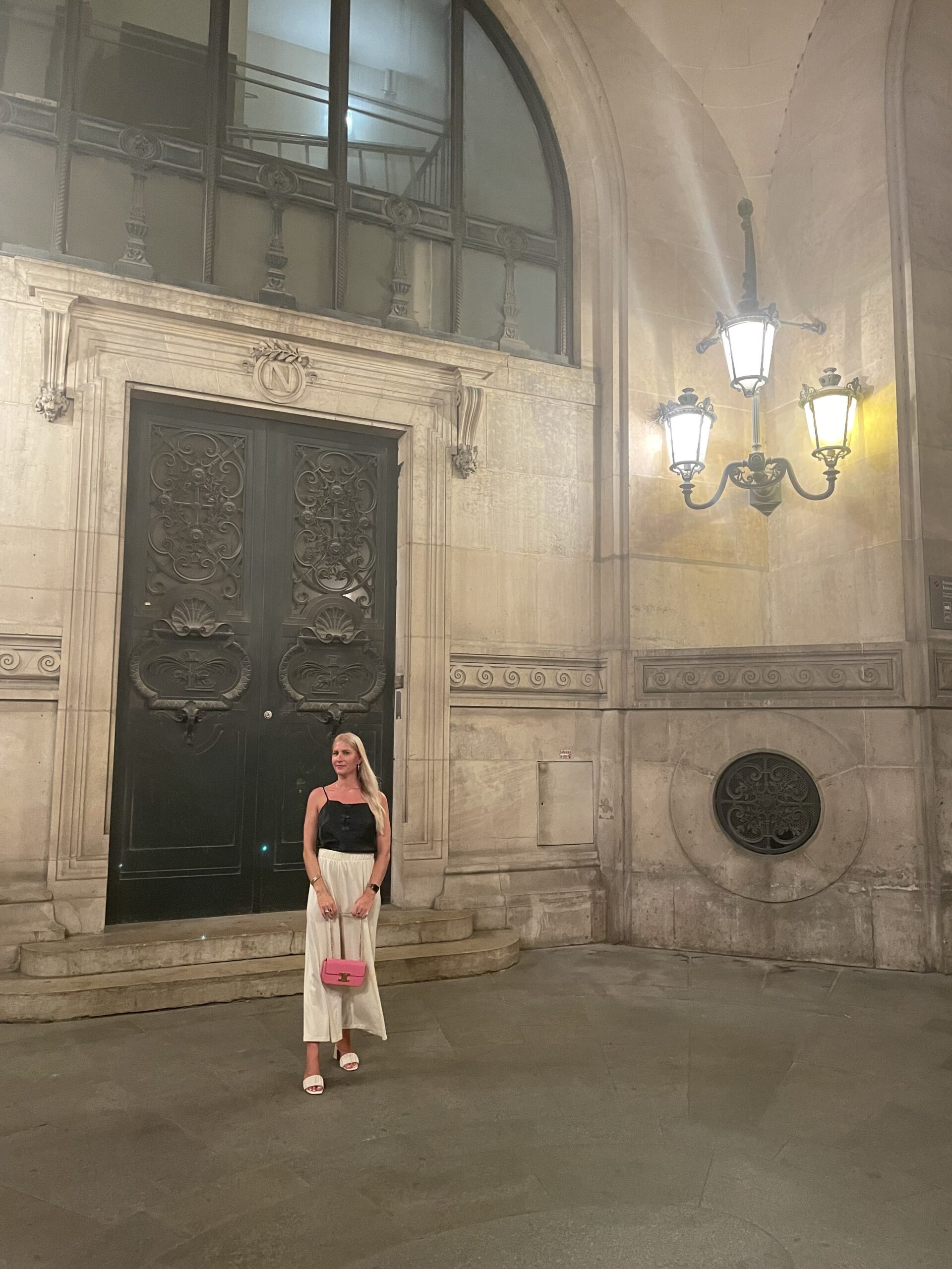 Ashley Eschenburg in a Medieval archway in Paris, France